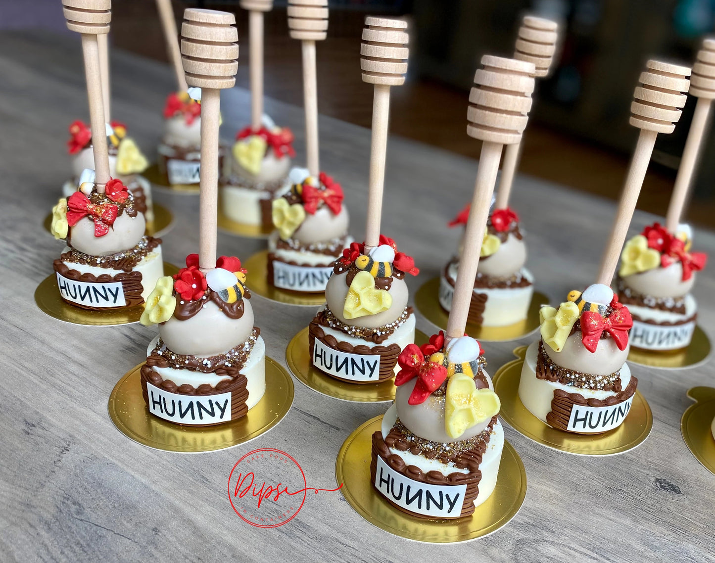 12 Hunny Pot Cake Pop/Oreo Combo treats with honey dipper sticks, Pooh Inspired honey pots, Winnie the Pooh hunny pots