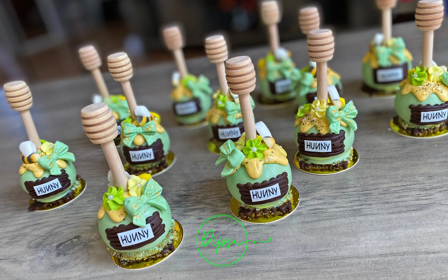 Hunny Pot Cake Pops with honey dipper stick,  Pooh Inspired honey pots, Baby shower cake pops