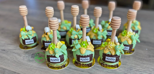 Hunny Pot Cake Pops with honey dipper stick,  Pooh Inspired honey pots, Baby shower cake pops