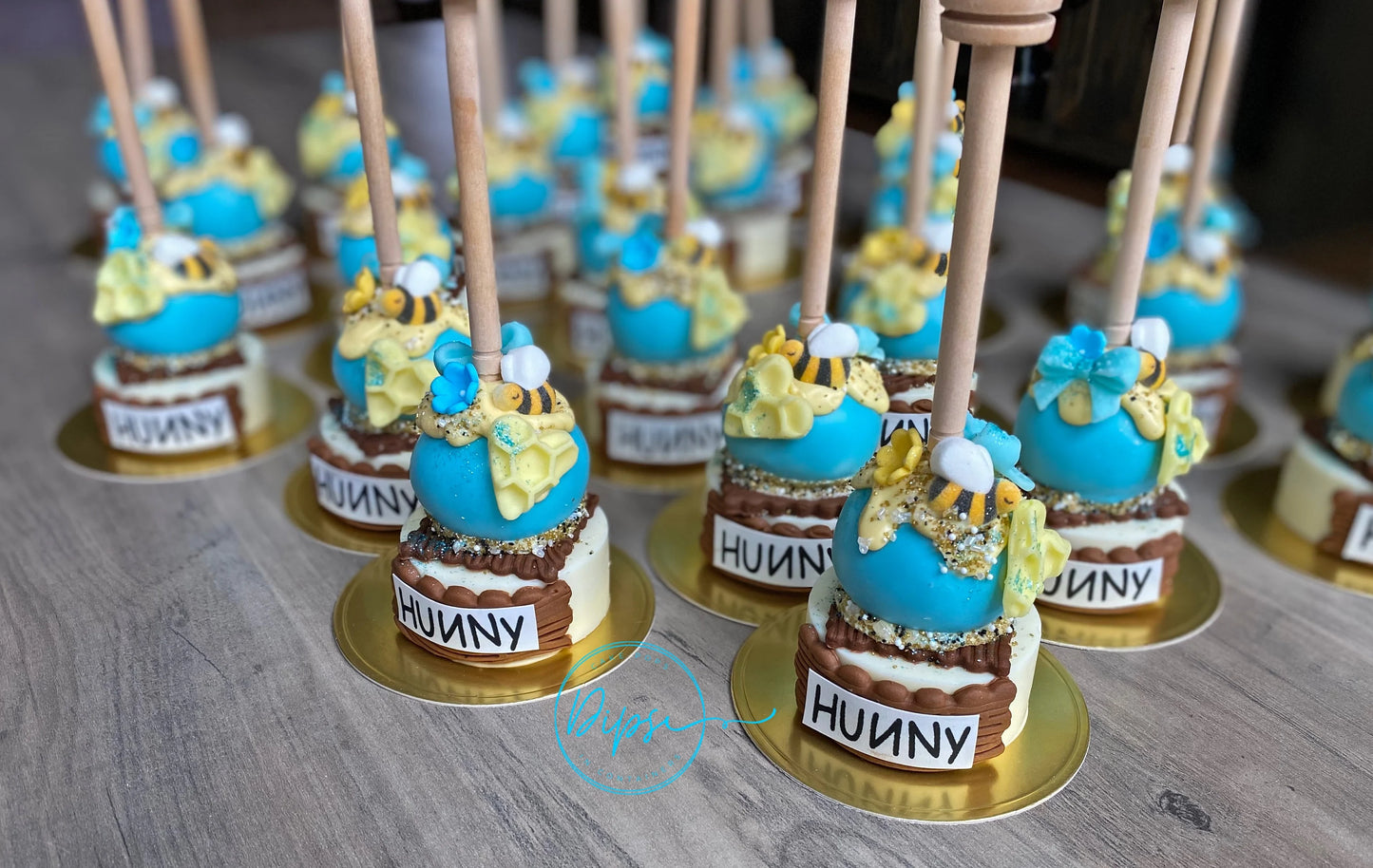 12 Blue Hunny Pot Cake Pop/Oreo Combo treats with honey dipper sticks, Pooh Inspired honey pots, Baby Shower, Baby boy